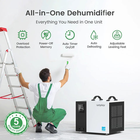 Serious 70 Pint Commercial Dehumidifier With Built In Pump And Drain Hose For Crawl Spaces And Large Basements Up To 5000 Sq Ft beside a worker painting.