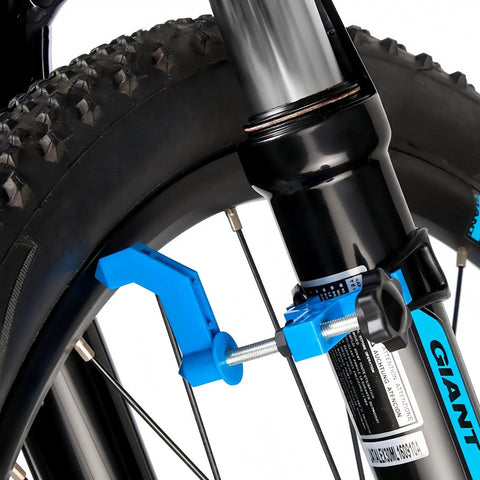 Ultra Portable Bike Wheel Truing Tool With Spoke Wrench, Compact Rim Adjustment Stand on mountain bike tire