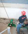 Worker using Heavy-Duty UT10-22 Puller for cable and wire pulling at job site