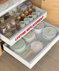 Heavy Duty Two Pack Expandable Pull Out Cabinet Organizer With Slick Full Extension Slides And No Sweat Adhesive Setup For Smooth Rolling Shelves That Handle Ninety Pounds In Clean White Finish, featuring jars and pots.