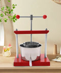 Heavy Duty Manual Fruit Wine Press Built Like A Tank Food Grade Stainless Steel Apple Grape Juicer on kitchen counter.
