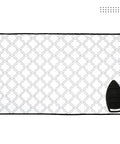 Big 48x28 Inch Ironing Mat Pad With 3mm Padding And Silicone Iron Rest For Steam Pressing On Tabletop Or Bed Heat Resistant Portable Quilting Travel Blanket White Tiles Pattern with visible black border and silicone iron rest.