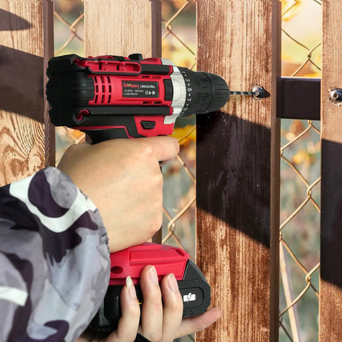 Person using 21V Cordless Drill Set With Dual Batteries And Charger, 25 Plus 3 Torque, 2 Speed, 315 In Lb Impact Drill Kit on fence