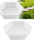 Two-Size Hexagon Stepping Stone Molds For Concrete, Reusable Plastic Cement Molds For DIY Walkways And Garden Paths next to grass path