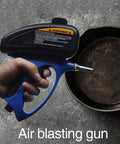 Heavy Duty Pneumatic Sandblaster And Airless Paint Sprayer Crushes Tough Rust Removal With Slick Metal Polish And Badass Edge Trimming For Daily Shop Use, air blasting gun in hand over a rusty metal surface.