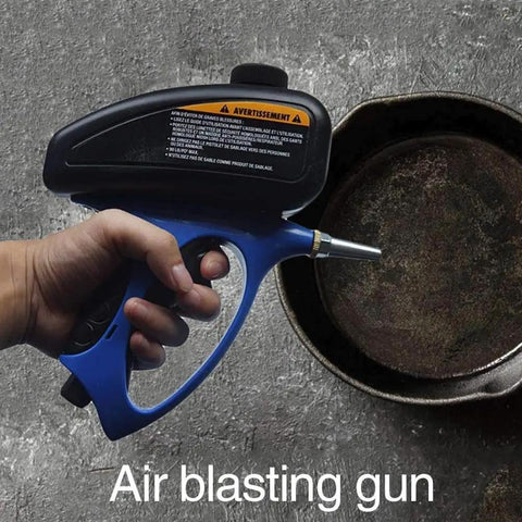 Heavy Duty Pneumatic Sandblaster And Airless Paint Sprayer Crushes Tough Rust Removal With Slick Metal Polish And Badass Edge Trimming For Daily Shop Use, air blasting gun in hand over a rusty metal surface.