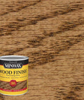 Top Shelf Oil Based Wood Stain In Special Walnut on wood grain background, showing deep color and smooth formula for furniture.