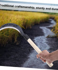 Heavy Duty Manganese Steel Garden Scythe With Long Handle For Weeding And Cultivation in outdoor use.