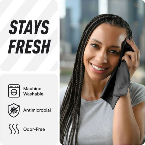 Woman using black pocket sized sweat towel on face, showcasing absorbent microfiber handkerchief, antimicrobial and machine washable features.