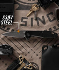 Fastball Slim Folding Knife With Lock Release, Lightweight EDC Pocket Knife Featuring A 3 Inch S30V Wharncliffe Blade on cloth
