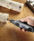 Totally Wireless Rotary Multi Tool With Super Cushioned Glove Grip and Killer 15 Piece Accessory Kit in use on wood.