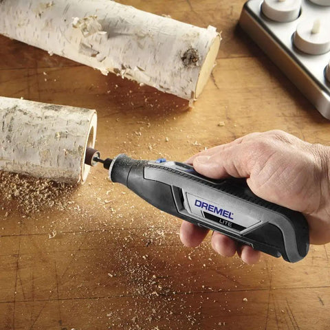 Totally Wireless Rotary Multi Tool With Super Cushioned Glove Grip and Killer 15 Piece Accessory Kit in use on wood.