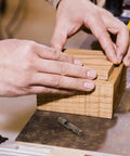 Hands working on wooden box using Brass Cylinder Concealed Hinges 5mm Thick Barrel Hinges Heavy Duty Bulk 10 Pack.