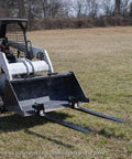 Beefy 60 Inch Clamp On Pallet Forks For Loaders And Skid Steers, 47 Inch Long Forks By 4 Inch Wide, 6,000 Pound Capacity mounted on loader