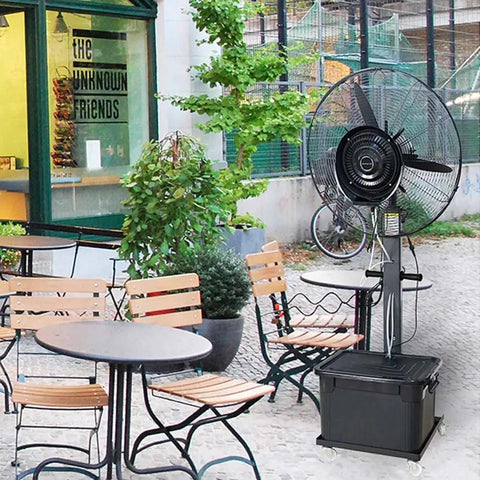 Heavy Duty 26 Inch Misting Oscillating Fan Slays Summer Heat Indoors Or On Patios, Super Powered 380W industrial floor cooler in a patio setting.