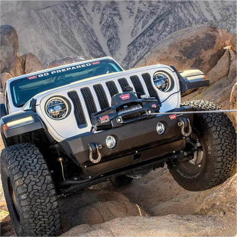 Jeep with Hub Wireless Receiver For Truck, SUV And Jeep Winches With Bluetooth Control on rocky terrain