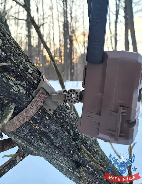 Versatile Trail Camera Mount For Moultrie Edge Models 2 And 3 Solar, Toolless Setup, mounted on tree with strap in forest