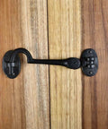 Heavy Duty 4.5 Inch Black Wrought Iron Swivel Style Hook And Eye Door Latch with Mounting Hardware on Wooden Door