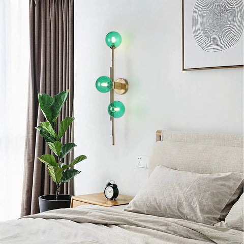 Dope Gold Long Strip 3 Light Globe Vanity Wall Sconce With Green Glass Shades Minimalist Mirror Bathroom Lighting Modern Contemporary Wall Fixture For Vanity And Mirror Area mounted on a bedroom wall