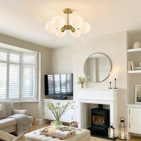 Brushed Gold Sputnik Flush Mount Ceiling Light With Six Milk Glass Globes in living room interior