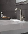 Precept Single Hole Bathroom Faucet in Brushed Nickel Finish with easy install on modern sink, single handle design visible.