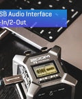 Professional Field Recorder For Filmmakers And Musicians with Two Locking XLR and TRS Inputs connected to laptop on desk