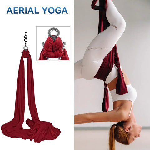 Aerial yoga hammock in red fabric used for yoga poses, featuring a close-up of the sturdy metal hook and performer in an inverted pose.