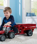 Child playing with Big Farm Tractor Toy For Kids With Realistic Lights And Sounds Opening Hood Removable Front Weights Three Point Hitch