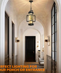 Built Like A Tank Modern Pendant Ceiling Light For Indoors Or Outdoors, Totally Waterproof Black Aluminum Porch Lantern featuring textured water ripple glass hanging in a hallway.