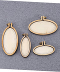 Four mini wood embroidery hoops with screws on a grey background. Models from the Five Piece Mini Wood Embroidery Hoops Set With Screws.