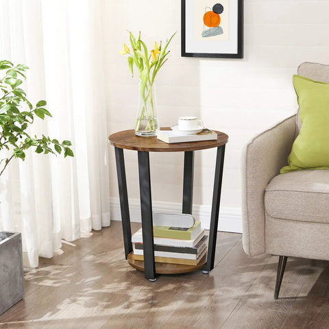 Round Side End Table Featuring Two Tier Storage Shelf No Sweat Assembly Nightstand For Cramped Rooms Super Sleek Bedside Accent Table In Rustic Brown And Ink Black For Living Space Or Bedroom Decor Total Haul with books and vase on top.