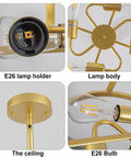 Close-up of gold 4 light modern chandelier pendant hanging light fixture showing E26 lamp holder, bulb, ceiling mount.