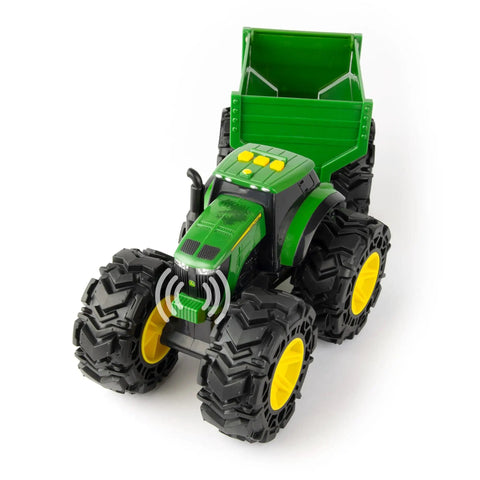 Rad Monster Treads Tractor Toy With Wagon Lights And Sounds shown from above, highlighting large tires and green wagon.