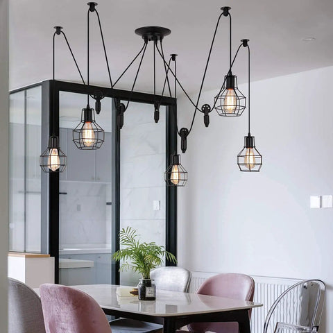 Five Head Adjustable Industrial Pendant Light With Vintage Spider Design, hanging in modern dining room over table.