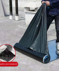 Hella Tough Self Adhesive Roofing Felt Roll With Butyl Asphalt Waterproof Tape and Heavy Duty Aluminum Foil backing being unrolled by a worker.