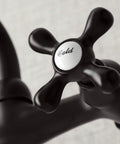 Close-up of handle on Victorian Style Two Handle Wall Mount Kitchen Faucet in Oil Rubbed Bronze, 7 Inch