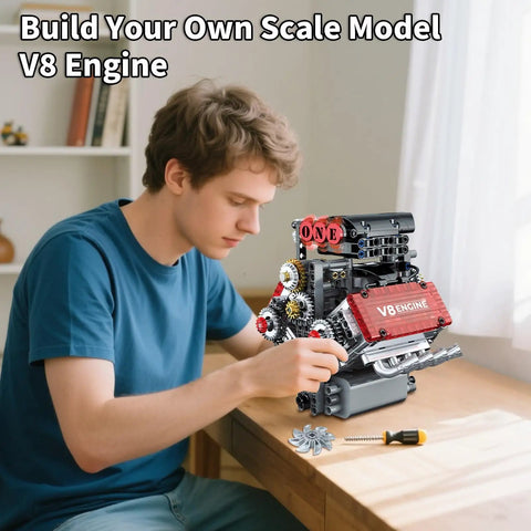 Person assembling Mini V8 Engine Kit That Runs Real Pistons And Moving Crankshaft 478 Piece STEM Engineering Model with tools on table