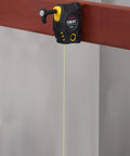 Magnetic Plumb Bob Setter 14 Ounce With Quick Stabilization Self Retracting 14.5 Foot Line attached to red steel beam