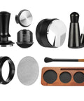 All In One 7 Piece Espresso Accessories Kit For Home Baristas Includes 54mm Espresso Tamper WDT Needle Stirrer Wood Tamping Station Dosing Funnel Brush Puck Screen And Distributor For Perfect Clean Shots Every Time, black color, set on white background
