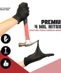 Built To Last Heavy Duty Black Nitrile Exam Gloves 4 Mil Thick Disposable And Powder Free Chemical Resistant Workhorse For Medical Emt And Mechanic Jobs Bulk Case Of One Thousand Count showing durability with a hammer.