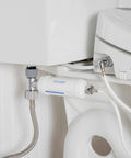 Swash Bidet Filter Premium Carbon Water Filtration System installed with electric bidet seat and bathroom plumbing visible.