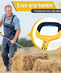 Man using 50 Inch Stainless Steel Garden Pitchfork With 10 Tine Head for spreading hay, focus on easy-grip handle design.