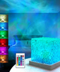 Ocean Wave Projector Light With 16 RGB Colors And Four Modes, Remote Control, Water Ripple Night Lamp illuminating a bedroom