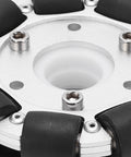 Close-up of 100mm aluminum omni wheel hub with black rubber rollers on a silver mounting plate