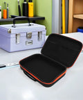 Portable Drill Bit Organizer With EVA Padding, open case with clear window, on workshop table near toolbox.