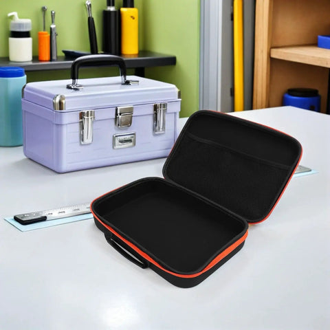 Portable Drill Bit Organizer With EVA Padding, open case with clear window, on workshop table near toolbox.