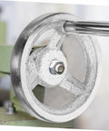 Close-up of Heavy Duty Cast Iron Handwheel With Chrome Plated Crank Handle For Lathe And Milling Machines, Precision Mechanical Revolving Knob.