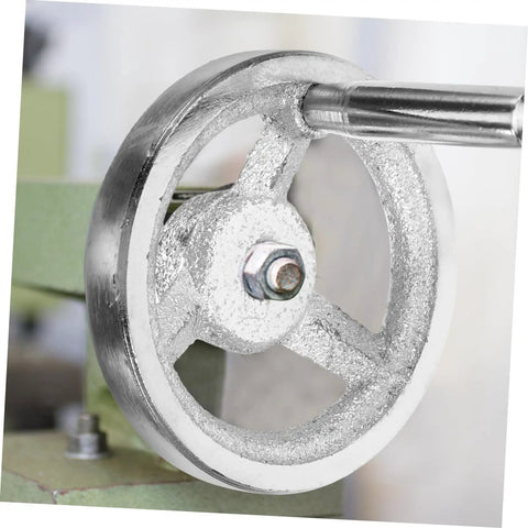 Close-up of Heavy Duty Cast Iron Handwheel With Chrome Plated Crank Handle For Lathe And Milling Machines, Precision Mechanical Revolving Knob.