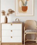 Grab These Snazzy Wooden Rattan Furniture Knobs And Pulls For Your Dresser Or Cabinet, Featuring Easy Single Hole Installation, Stylish Round Weave Design, And Durable Build Ideal For Upgrading Kitchen Cupboards Bedroom Drawers Or Bathroom Storage Units. Wooden rattan round weave knob on white dresser drawer.