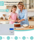 Digital Kitchen Scale With USB Rechargeable Power, Six Measurement Units displayed near cake baking scene in kitchen